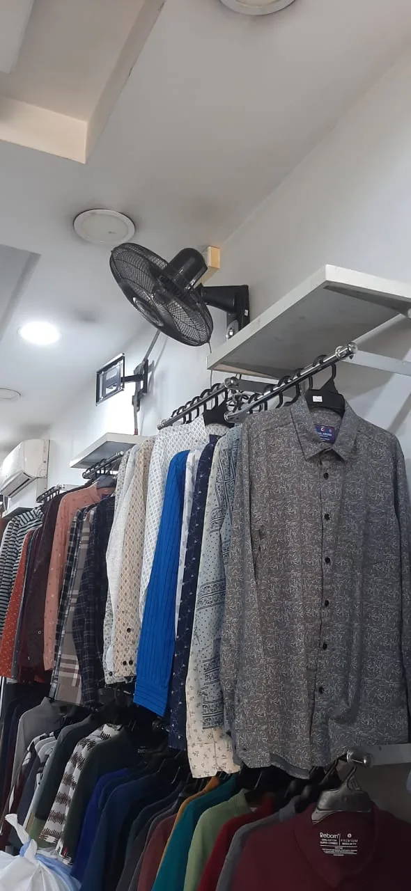 A closer look at shirts displayed in store